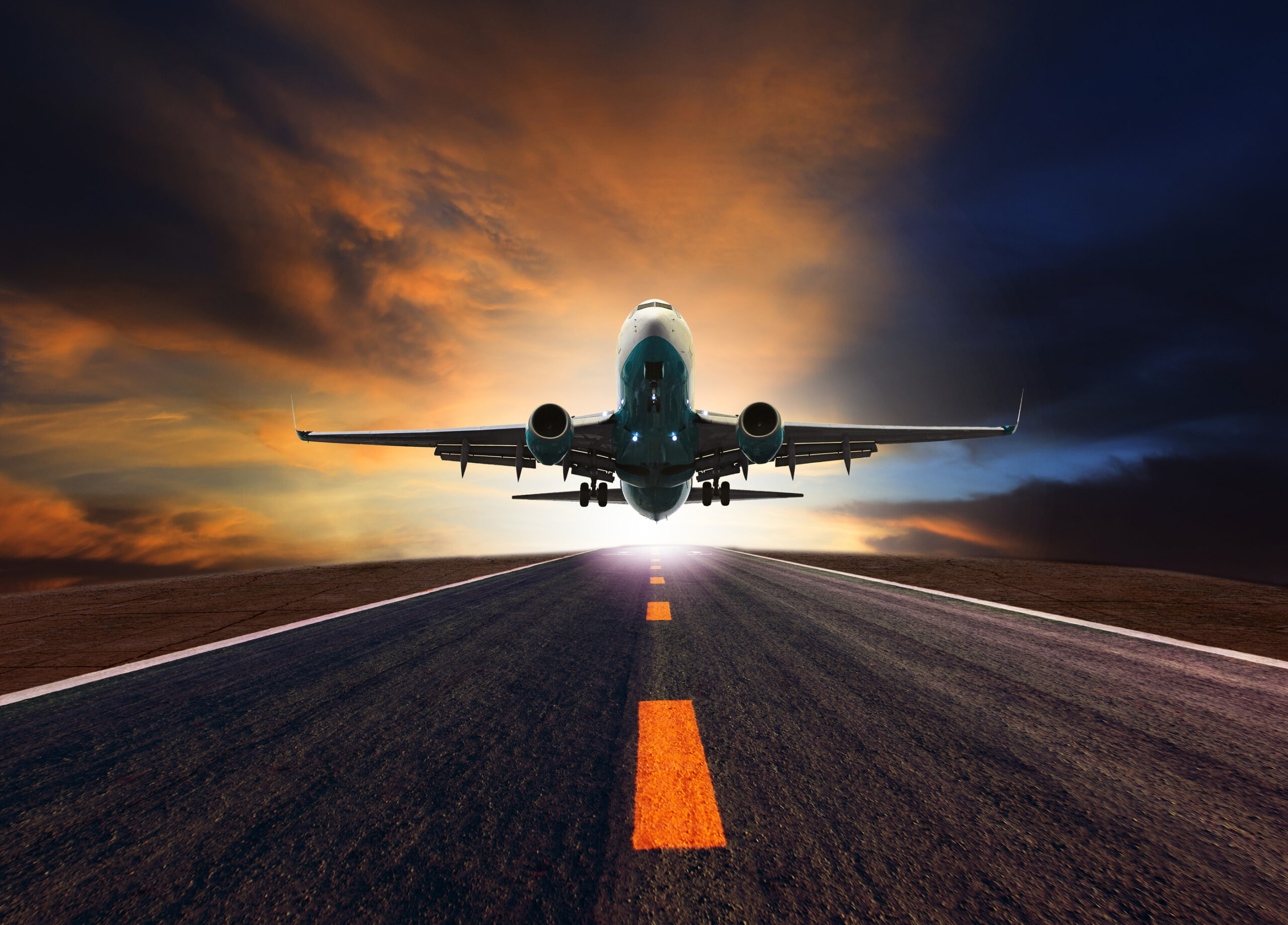 passenger jet plane flying over airport runway against beautiful dusky sky use for aircraft transport and cargo logistic and traveling business industry